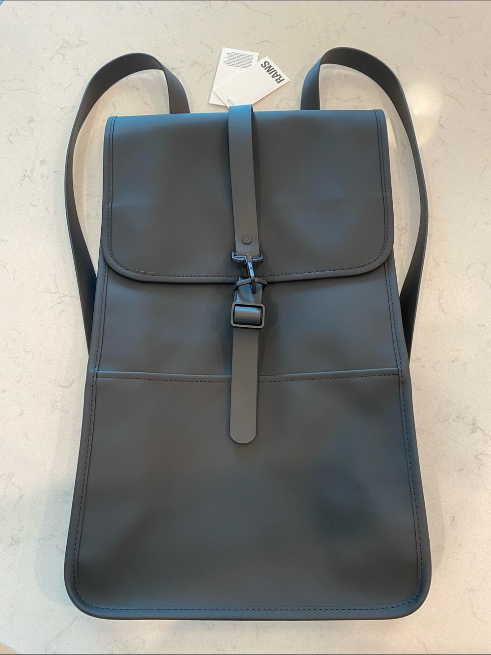 Rains Black Matte Roll-Top Backpack with Strap Closure